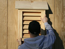 Simply push the bat house over the gable vent